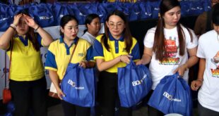 BDO employees distribute relief packs to 1,780 typhoon-stricken families in Laguna