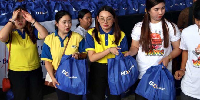 BDO employees distribute 1,780 relief packs to typhoon-stricken families in Laguna