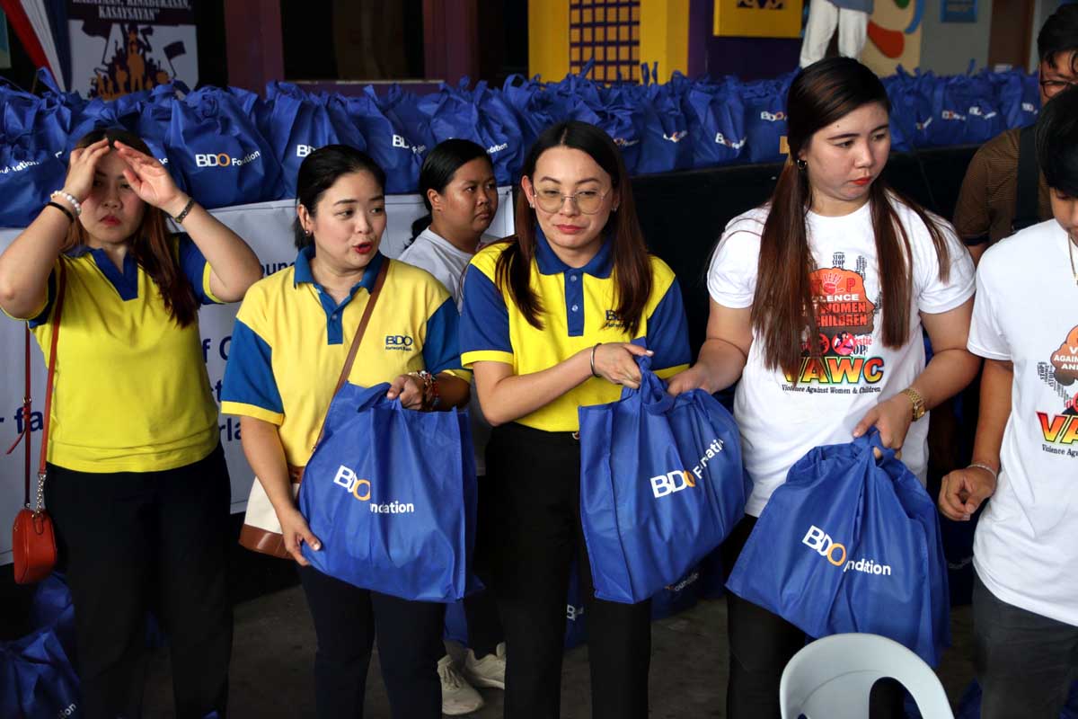 BDO employees distribute 1,780 relief packs to typhoon-stricken families in Laguna